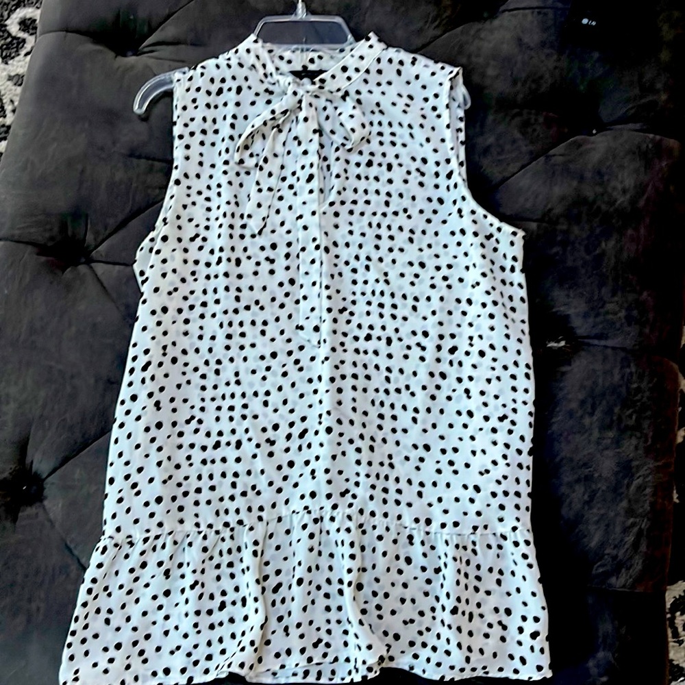 Sleeveless peplum blouse